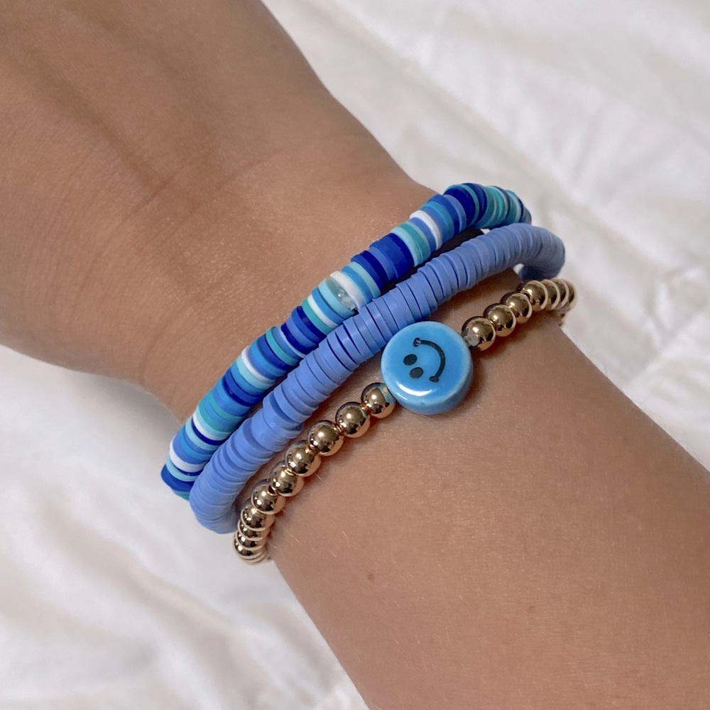 Blue smiley face bracelets